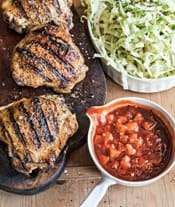 GRILLED CHICKEN THIGHS with chunky peach-bourbon barbecue sauce and hot and sour lime slaw