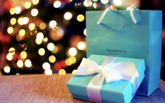 7034737-christmas-tree-lights-holiday-gift-blue-box-ribbon-bow-bag-bokeh